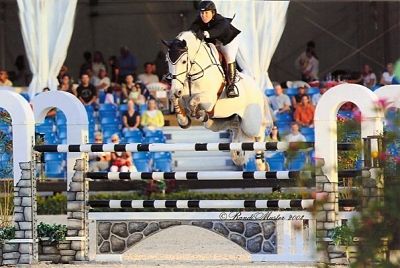 horse going over a jump